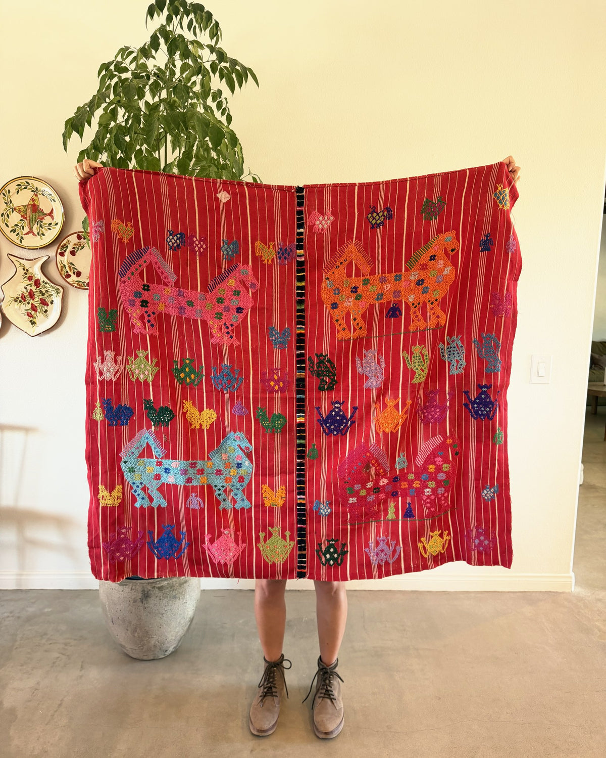 Vintage Guatemalan handwoven cotton textile with horse and frog motifs on red