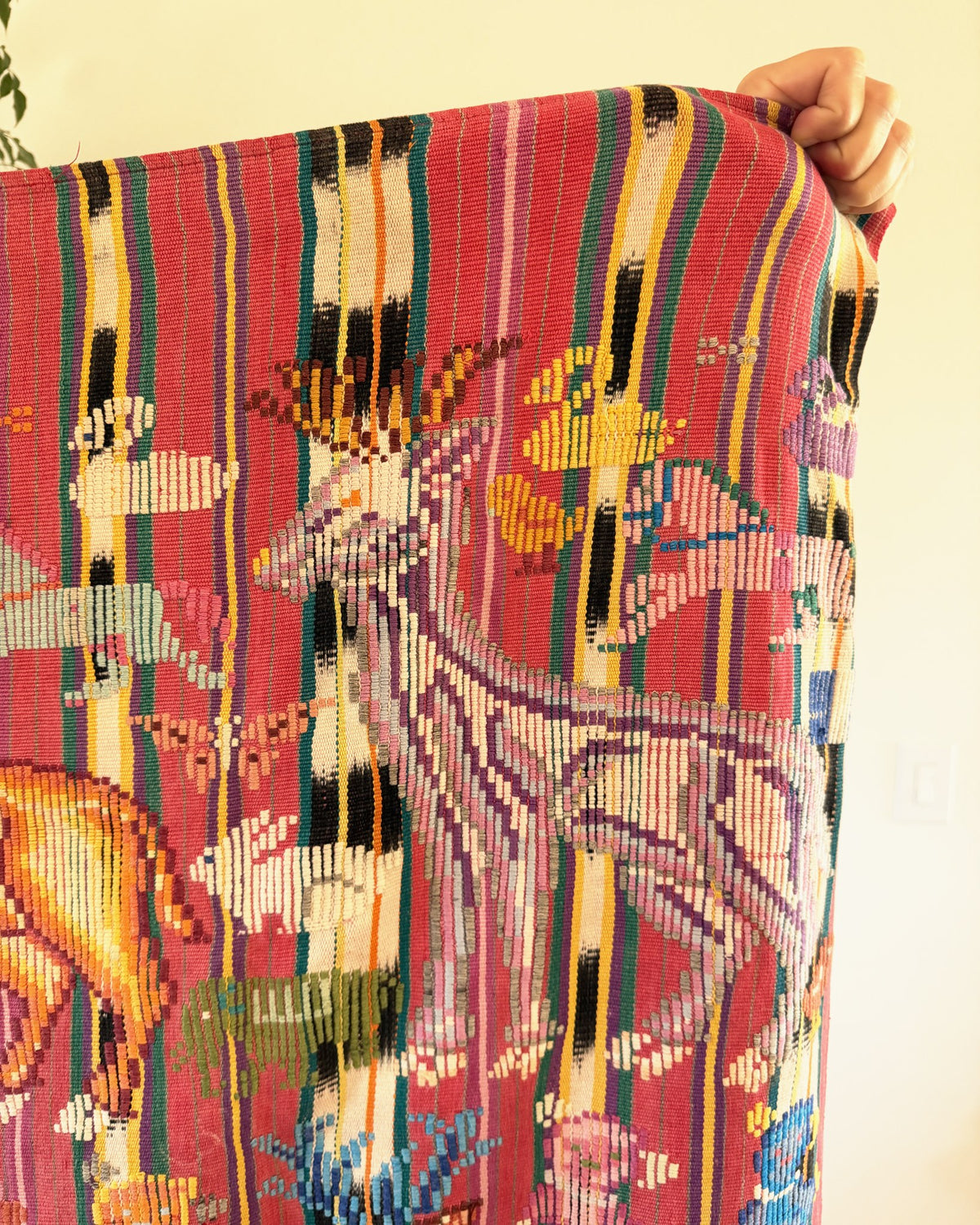 Vintage Guatemalan handwoven cotton textile with embroidered deer on a striped ground
